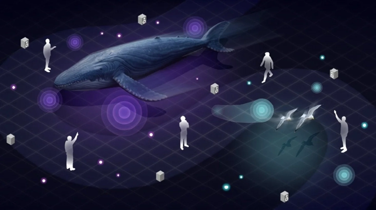 クジラのホログラムを中心に人影や鳥が配置された仮想空間のデジタルアート
