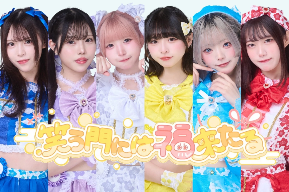 カラフルなフリル衣装を着た女性アイドルグループ